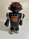Vintage New Bright Magnatron MT-2 Walking Smoking Robot Black Hong Kong 15 Inch. Fixed Price $30.00.